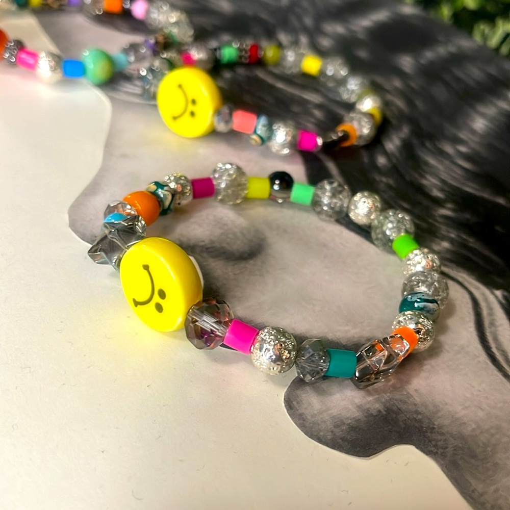 Individual Colorful Beaded Bracelet with Smiley Faces $20 each.